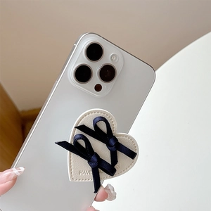 Support de téléphone cœur en cuir avec nœuds marine et texte Have a Nice Day
