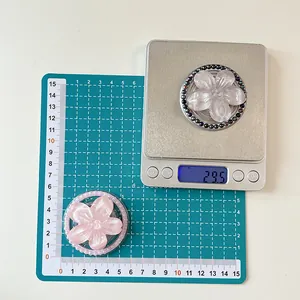 Detail of pink floral magnetic phone sockets showing 5.5cm size and 29.5g weight measurement