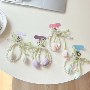 Ciondoli per telefono a tulipano con perle e fiocchi in quattro delicati colori pastello