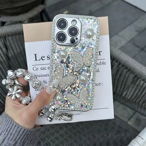 Luxury iPhone case with glitter sequins, 3D diamond butterflies, pearls, and flower wrist strap
