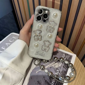 Sparkly silver iPhone case with 3D crystal bears and matching pearl wrist strap