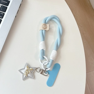 Detail of light blue braided phone wrist strap with silver star charm and T-shaped pad