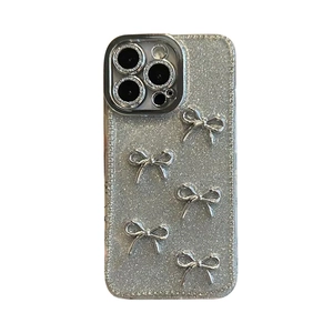 Glitter silver phone case for iPhone 16 Pro Max with 3D metallic bow decorations