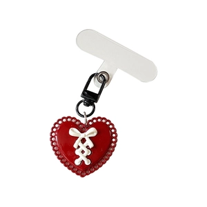 Red hollow heart phone charm with white bow, black lobster clasp and clear gasket