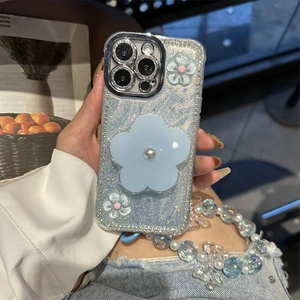 Detail of glitter iPhone case with 3D blue flower grip and colorful pearl lanyard strap