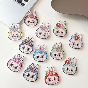 Set of 12 colorful acrylic cartoon rabbit phone stands with floral monster designs