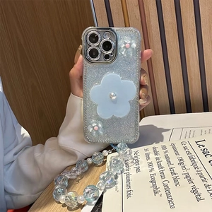 Sparkly light blue flower phone case with pearl air-bag stand and beaded wrist strap