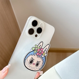Cartoon monster phone grip with colorful bunny ears and flowers on a white case