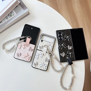 Chic folding phone case set with leather texture, ribbon bows and luxury pearl wrist chains
