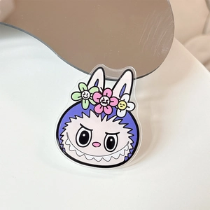 Close-up of Labubu style acrylic phone socket with cartoon rabbit and flowers