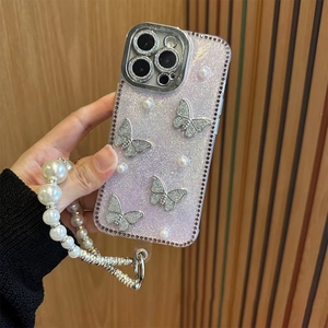 Purple glitter iPhone case with rhinestones, butterfly charms and pearl lanyard