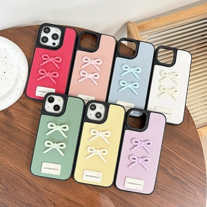 Litchi leather texture iPhone case with 3D bowknot in assorted macaron colors
