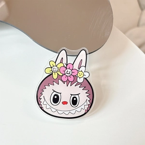 Detail of cute pink rabbit acrylic phone stand with 3D colorful floral decorations