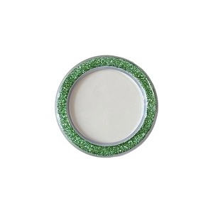 Green glitter phone camera lens protector ring with silver metal edge on white background