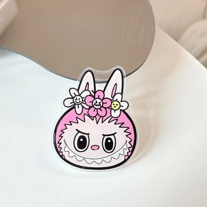 Macro shot of Labubu acrylic phone grip with cute cartoon bunny and flower details