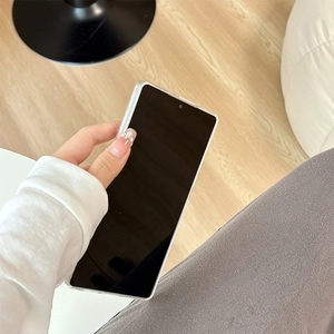 Close-up of a clear transparent protective phone case fitted on a black smartphone
