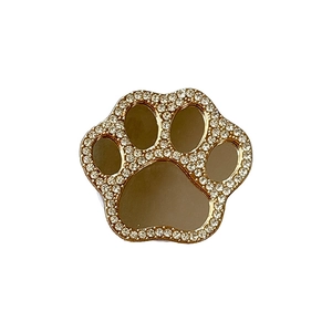 Sparkling paw-shaped phone grip with gold base and rhinestones for mobile mirror use