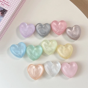 Glittery heart phone grip sockets in multi-color pearlescent resin for smartphones
