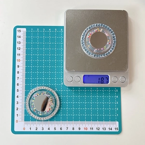 Detail view showing a 5cm diameter and 18.7g weight of the round mirror phone socket