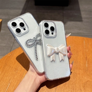 Glitter transparent iPhone case with 3D beaded bow decoration and sparkle finish