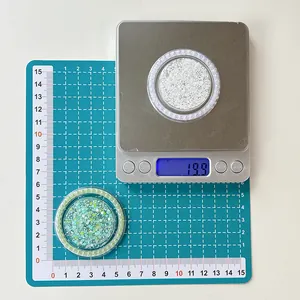 Macro detail of two containers showing pearlescent glitter and sequins for phone grips