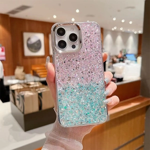 Detail of pink and green gradient glitter phone case with silver camera metal protector