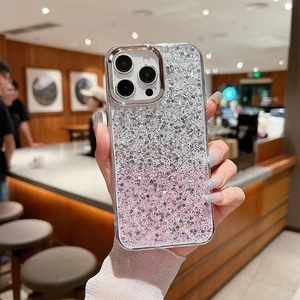 Detailed close-up of glitter gradient phone case with silver to pink sparkling sequins