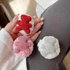 Plush rhinestone bear phone grip holder with sparkling crystals in red, pink, and silver