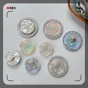 Magnetic polka dot phone grip with crystal rhinestones and heart pattern details