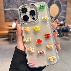 Close-up of 3D food resin charms on glitter iPhone case with shrimp and egg noodles
