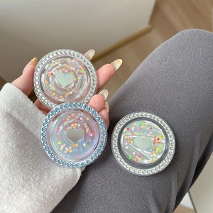 Sparkly rhinestone phone grip with colorful sequins and silver mirror heart decoration