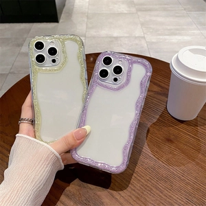 Glitter wavy edge phone case for iPhone in gold and purple with translucent back