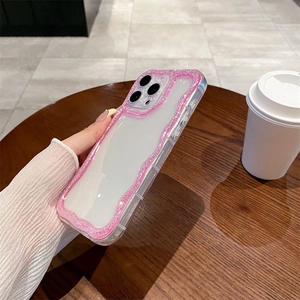 Detail of pink glitter wavy edge case with clear back for iPhone 17 Pro Max