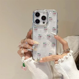 Transparent glitter iPhone case with cherry rhinestone patterns and pearl charm