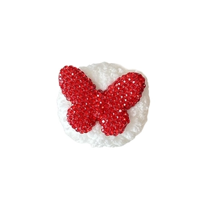 Plush bear phone grip with red rhinestone butterfly and soft faux fur texture