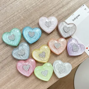 Chic 3D heart-shaped phone grip stand in colorful pearlescent finish for mobile devices