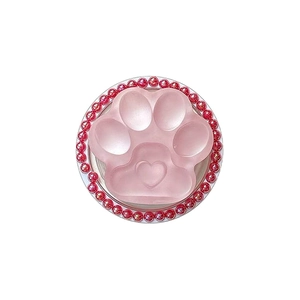 Pink matte resin cat paw phone grip with heart motif and sparkling rhinestone accents