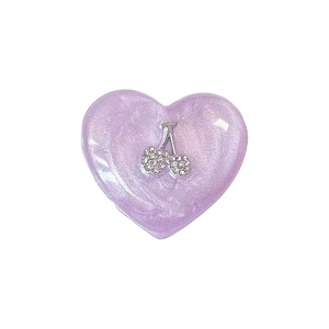 Purple glitter heart phone grip with silver cherry motif on a clean white background
