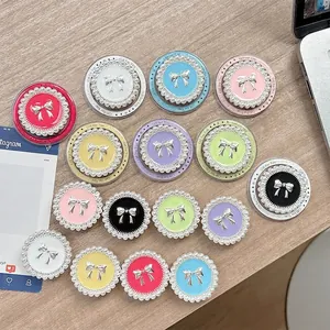 Support téléphone luxe avec perles et nœud argenté en plusieurs couleurs pastel