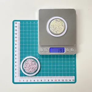Close-up of glitter sequins for phone holders showing weight on digital scale and dimensions