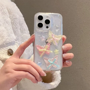 Detailed view of 3D resin butterflies and silk ribbons on a clear iPhone case