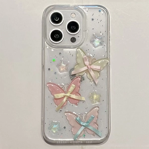 Detail of transparent iPhone case with glitter stars and 3D resin butterfly charms