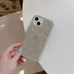 Luxury full rhinestone phone case for iPhone 16 Pro Max featuring sparkling silver crystals