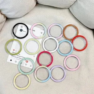 Colorful Magsafe magnetic phone socket bases in various vibrant macaron colors on fabric