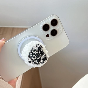 Luxury black rhinestone heart phone socket with white plush fur trim on phone back