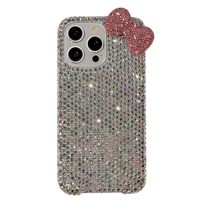 Luxury iPhone case with silver rhinestones and a pink crystal bow decoration on white background