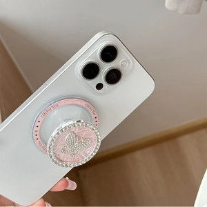 Pink MagSafe phone grip featuring a rhinestone butterfly design and Gift For You text