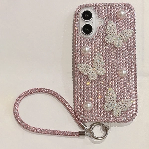 Detailed view of pink rhinestone phone case with 3D butterflies and pearl accents