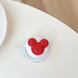 Detail of red rhinestone cartoon silhouette phone socket with white plush padding