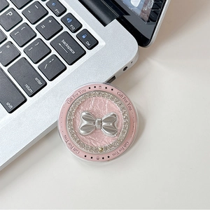 Detail of pink magnetic Griptok with silver bow, rhinestones, and Gift For You text